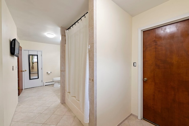 10608 Moody Ave, Chicago Ridge, IL 60415 - hallway with light tile patterned floors and baseboard heating