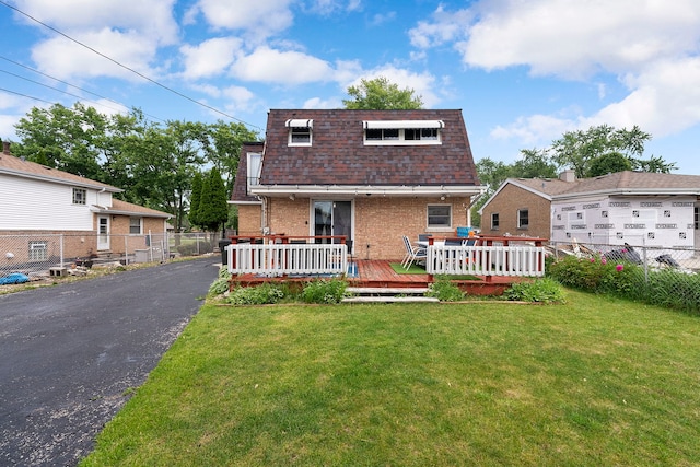 10608 Moody Ave, Chicago Ridge, IL 60415 - rear view of property featuring brick siding, mansard roof, a wooden deck, and a shingled roof