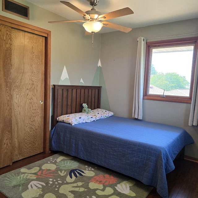 421 W 1st St, Stillman Valley, IL 61084 - bedroom with wood finished floors and ceiling fan