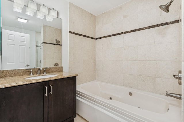 1443 W Wrightwood Ave Unit B, Chicago, IL 60614 - full bathroom featuring vanity, tile walls, and a combined bath / shower with jetted tub