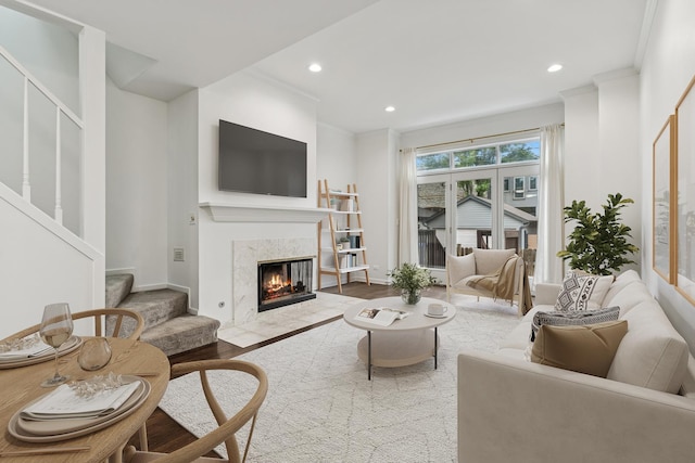1443 W Wrightwood Ave Unit B, Chicago, IL 60614 - living room featuring a premium fireplace, wood finished floors, stairway, recessed lighting, and ornamental molding