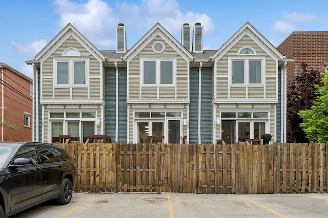 1443 W Wrightwood Ave Unit B, Chicago, IL 60614 - view of property featuring uncovered parking and a chimney