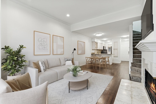 1443 W Wrightwood Ave Unit B, Chicago, IL 60614 - living room with crown molding, recessed lighting, dark wood-type flooring, a fireplace with flush hearth, and baseboards