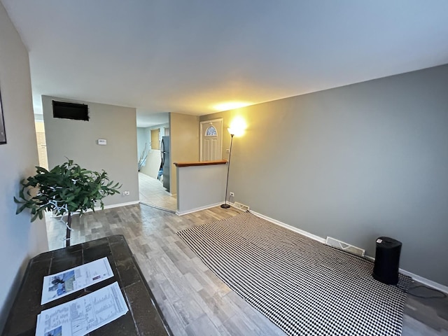 16612 Ashland Ave, Markham, IL 60428 - unfurnished room with baseboards and wood finished floors