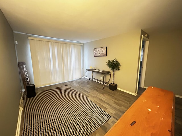 16612 Ashland Ave, Markham, IL 60428 - living area featuring wood finished floors and baseboards