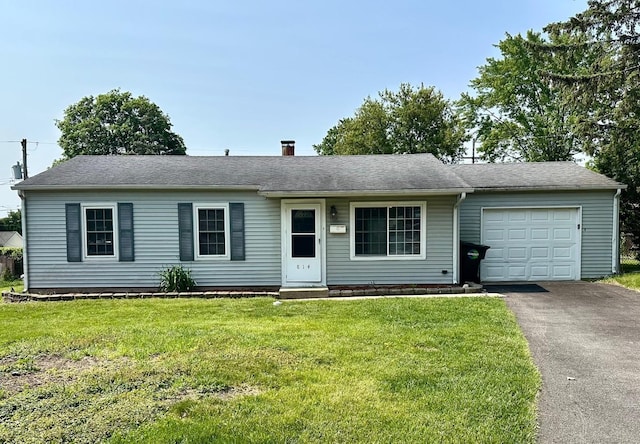 814 Spruce Ct, Streamwood, IL 60107 - ranch-style home featuring a garage, driveway, a front yard, and a chimney