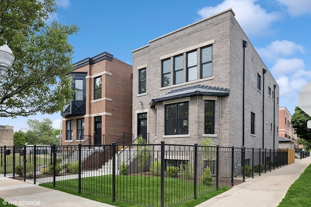 3300 S Giles Ave, Chicago, IL 60616 - view of front facade with brick siding and a fenced front yard