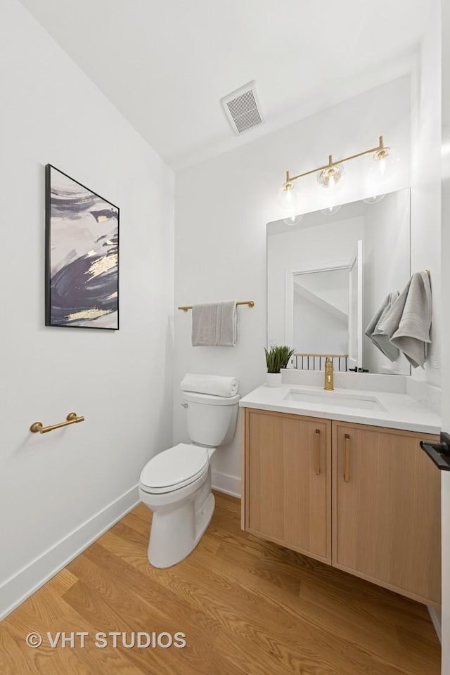 3300 S Giles Ave, Chicago, IL 60616 - bathroom featuring wood finished floors and vanity