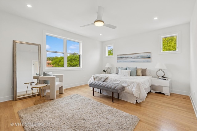 3300 S Giles Ave, Chicago, IL 60616 - bedroom with light wood-type flooring, a ceiling fan, and recessed lighting