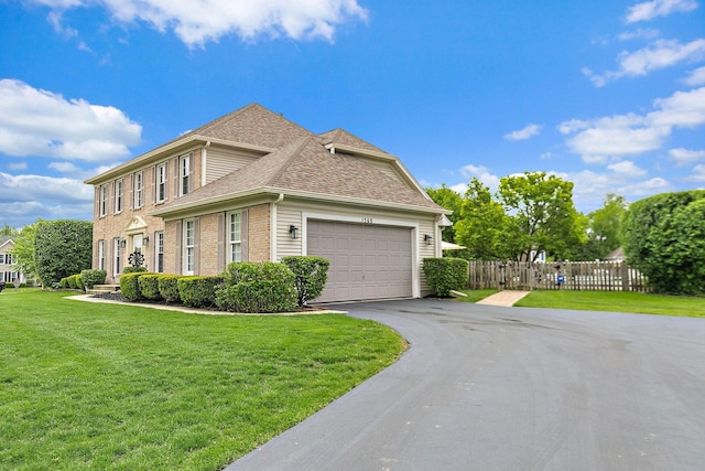 1560 Kensington Dr, Algonquin, IL 60102 - view of side of property with asphalt driveway, a garage, roof with shingles, and brick siding