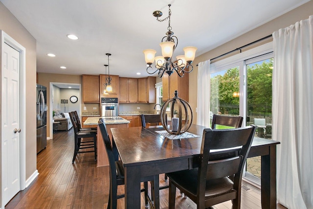 1560 Kensington Dr, Algonquin, IL 60102 - dining area with a chandelier, dark wood finished floors, and recessed lighting