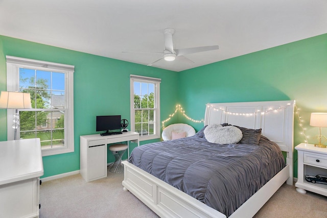 1560 Kensington Dr, Algonquin, IL 60102 - bedroom with light colored carpet, baseboards, and a ceiling fan