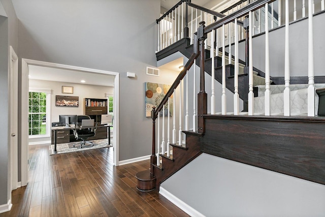 1560 Kensington Dr, Algonquin, IL 60102 - stairs with baseboards, wood-type flooring, and a towering ceiling