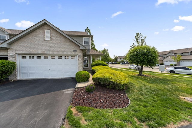 7008 Century Ct, Tinley Park, IL 60477 - view of front of property with driveway, a garage, a front yard, and brick siding