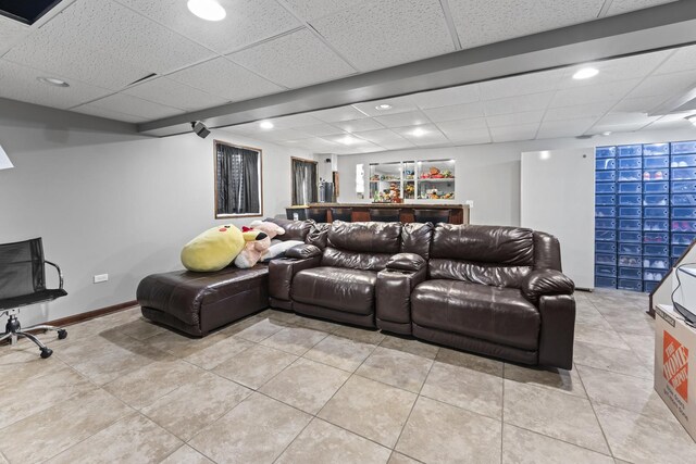 7008 Century Ct, Tinley Park, IL 60477 - cinema room featuring recessed lighting, light tile patterned flooring, a paneled ceiling, a bar, and baseboards