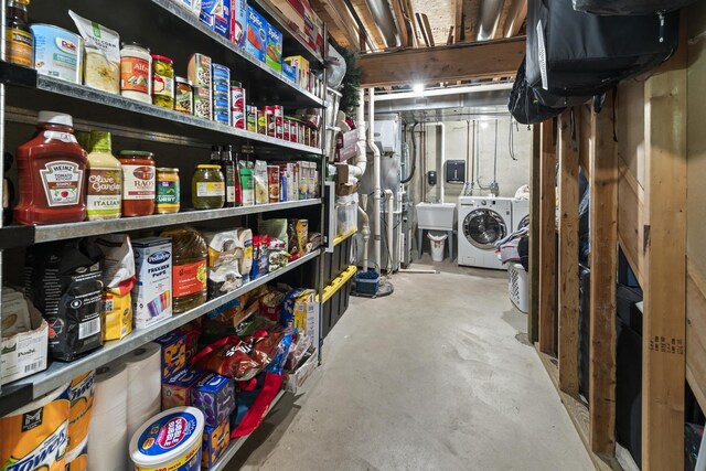 7008 Century Ct, Tinley Park, IL 60477 - unfinished basement featuring independent washer and dryer and a sink