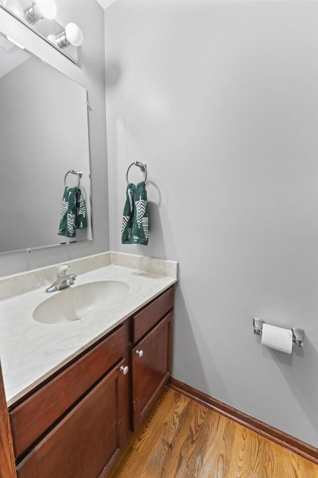7008 Century Ct, Tinley Park, IL 60477 - bathroom with vanity and wood finished floors