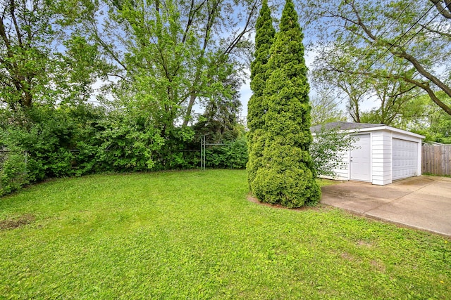 323 Mark Ave, Glendale Heights, IL 60139 - view of yard featuring an outbuilding and a detached garage