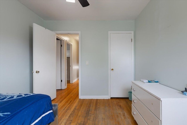 8353 N Drake Ave, Skokie, IL 60076 - bedroom with light wood-type flooring, baseboards, and a ceiling fan