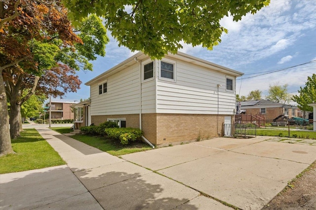 8353 N Drake Ave, Skokie, IL 60076 - view of property exterior with brick siding