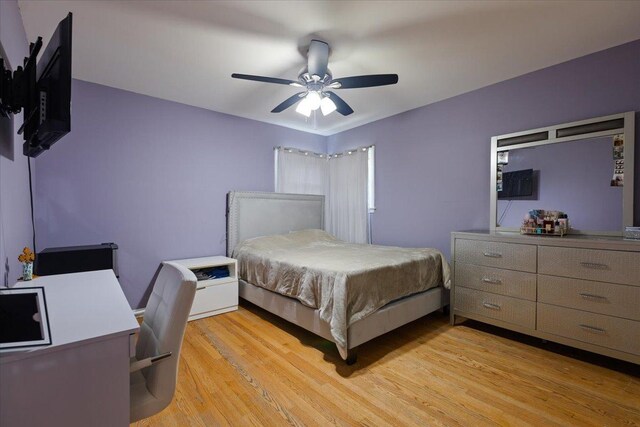 8353 N Drake Ave, Skokie, IL 60076 - bedroom featuring light wood-type flooring and a ceiling fan