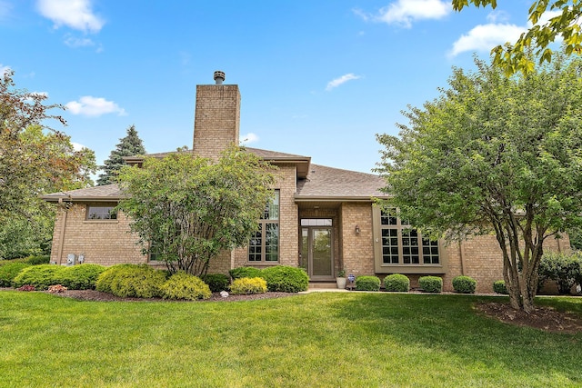 20142 Crystal Lake Way, Frankfort, IL 60423 - view of front of house with brick siding, a chimney, and a front yard