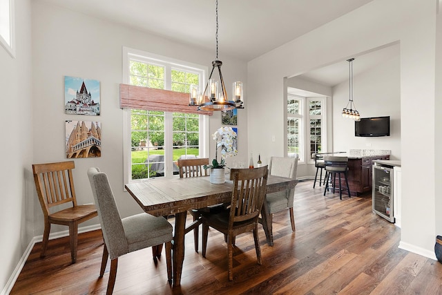 20142 Crystal Lake Way, Frankfort, IL 60423 - dining room with beverage cooler, wood finished floors, a chandelier, and bar area
