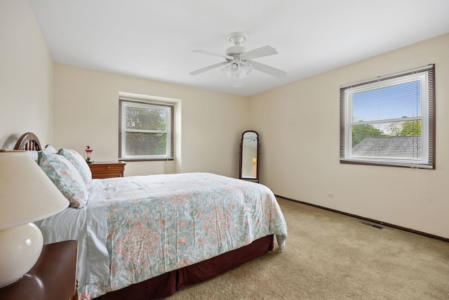 1486 Haverhill Dr, Wheaton, IL 60189 - carpeted bedroom featuring baseboards and ceiling fan