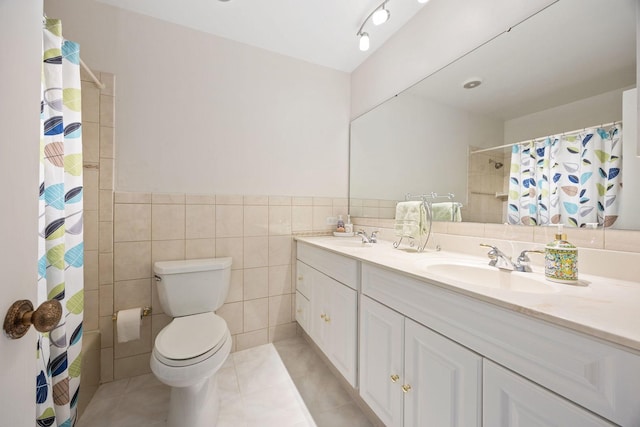 1486 Haverhill Dr, Wheaton, IL 60189 - full bath with double vanity, tile patterned floors, tile walls, toilet, and a shower with curtain