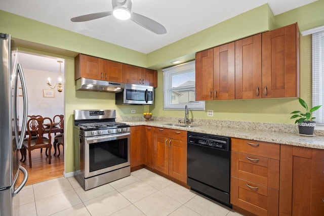 1486 Haverhill Dr, Wheaton, IL 60189 - kitchen with stainless steel appliances, a sink, under cabinet range hood, light stone counters, and a ceiling fan