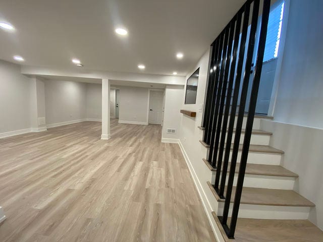 2705 Cuyler Ave, Berwyn, IL 60402 - finished basement with light wood-style floors, stairs, and recessed lighting