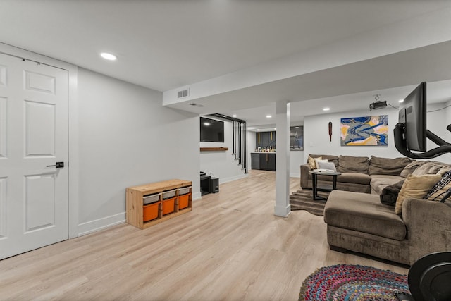 2705 Cuyler Ave, Berwyn, IL 60402 - living area with light wood finished floors, stairs, and recessed lighting
