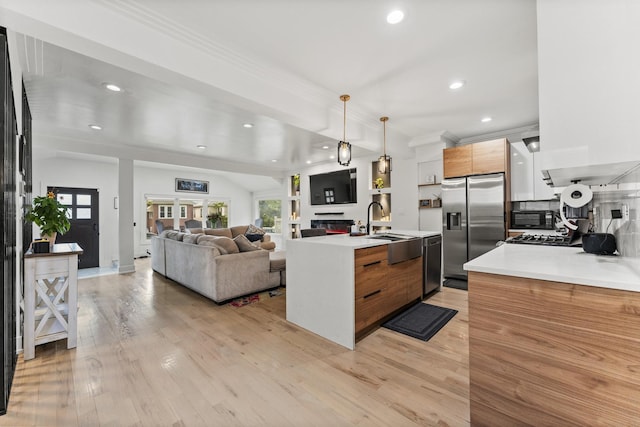 2705 Cuyler Ave, Berwyn, IL 60402 - kitchen featuring appliances with stainless steel finishes, modern cabinets, light countertops, recessed lighting, and light wood finished floors