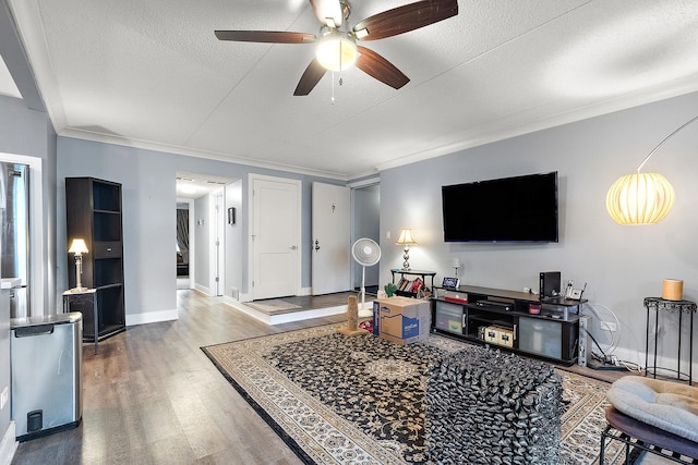 15713 Orlan Brook Dr Unit 97, Orland Park, IL 60462 - living area with wood finished floors, a ceiling fan, crown molding, and a textured ceiling
