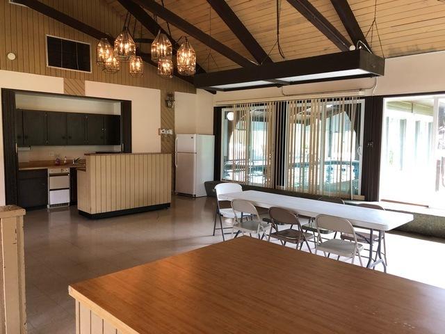 15713 Orlan Brook Dr Unit 97, Orland Park, IL 60462 - dining space featuring plenty of natural light, a chandelier, a wood ceiling with exposed beams, and high vaulted ceiling