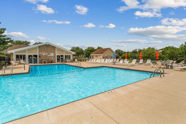 15713 Orlan Brook Dr Unit 97, Orland Park, IL 60462 - community pool with a patio area