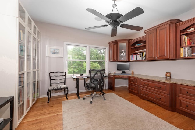 647 Oak Ln, South Elgin, IL 60177 - office featuring built in desk, ceiling fan, and light wood-style floors