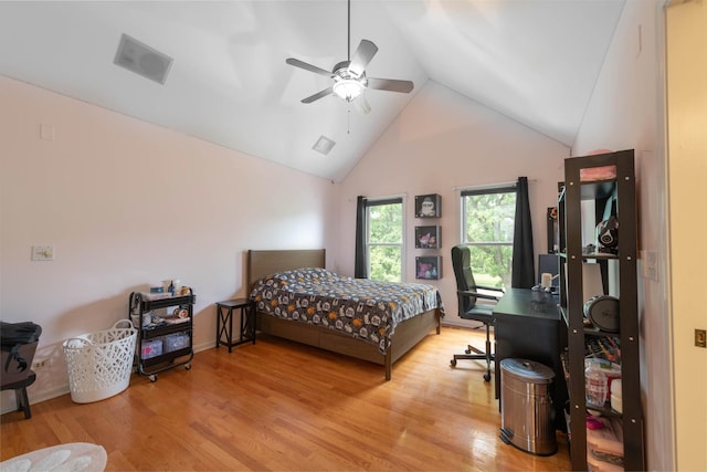 647 Oak Ln, South Elgin, IL 60177 - bedroom with light wood finished floors, a ceiling fan, and high vaulted ceiling