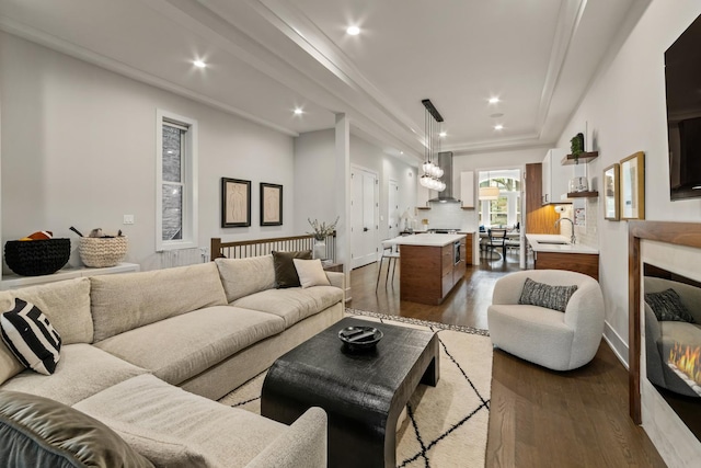 1304 N Hoyne Ave Unit 1, Chicago, IL 60622 - living area featuring dark wood finished floors, recessed lighting, ornamental molding, and baseboards