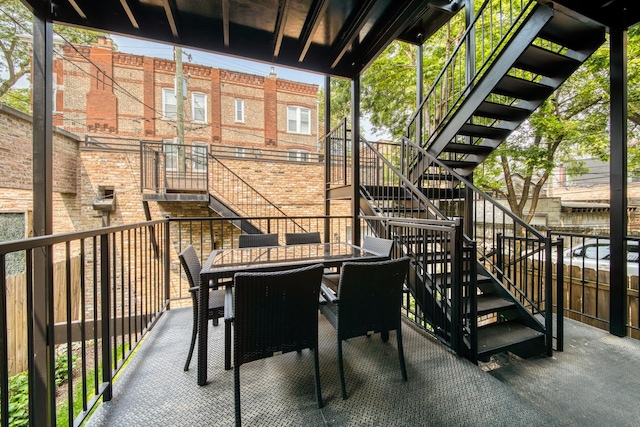1304 N Hoyne Ave Unit 1, Chicago, IL 60622 - view of patio with stairs and outdoor dining area
