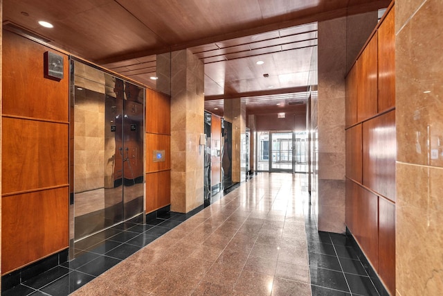 1122 N Clark St Unit 1710, Chicago, IL 60610 - lobby featuring tile walls and recessed lighting