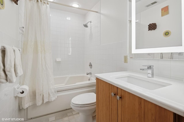 920 W Wolfram St Unit 3, Chicago, IL 60657 - bathroom with vanity, toilet, shower / tub combo, and tile walls