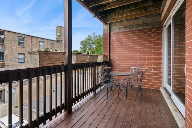 920 W Wolfram St Unit 3, Chicago, IL 60657 - wooden deck featuring outdoor dining area