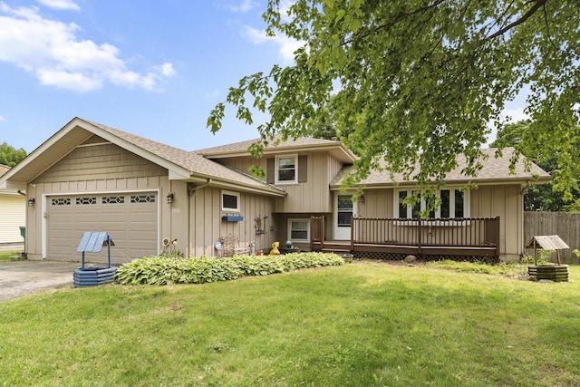 3908 Juniper Ave, Joliet, IL 60431 - split level home featuring board and batten siding, a garage, driveway, a wooden deck, and a shingled roof