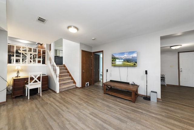 3908 Juniper Ave, Joliet, IL 60431 - living area featuring wood finished floors, stairs, and baseboards