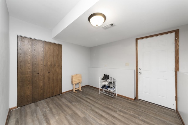 3908 Juniper Ave, Joliet, IL 60431 - unfurnished bedroom with light wood finished floors, a closet, and baseboards