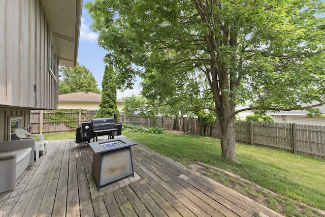 3908 Juniper Ave, Joliet, IL 60431 - wooden deck with a fire pit and area for grilling