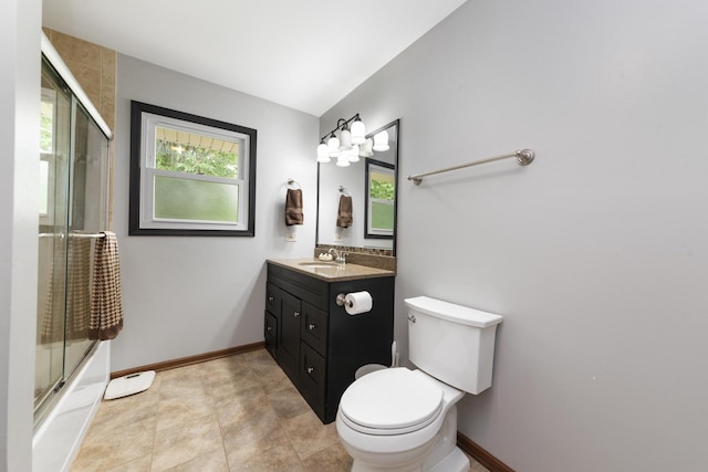 3908 Juniper Ave, Joliet, IL 60431 - full bathroom featuring vanity, toilet, bath / shower combo with glass door, and baseboards