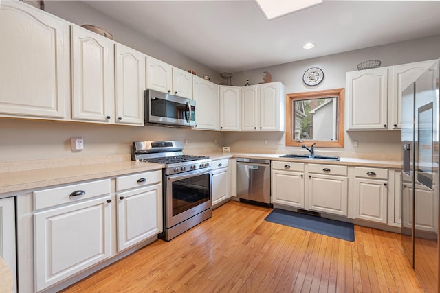 0S630 Hubbard Pl, Geneva, IL 60134 - kitchen featuring stainless steel appliances, recessed lighting, white cabinets, light countertops, and light wood-style flooring
