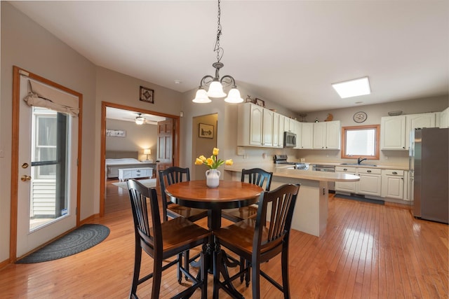 0S630 Hubbard Pl, Geneva, IL 60134 - dining space featuring light wood finished floors and ceiling fan